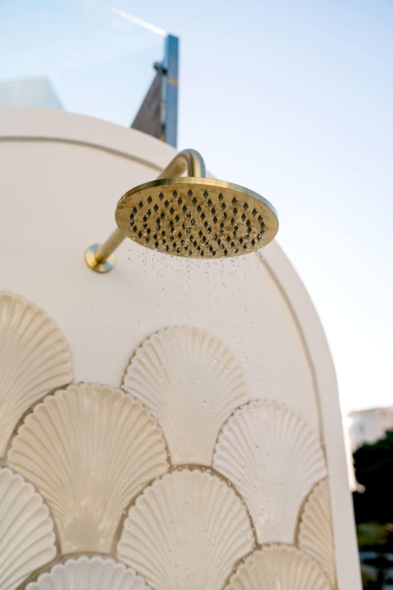 Gifts of the Sea handmade ceramic shell tiles in a luxury shower