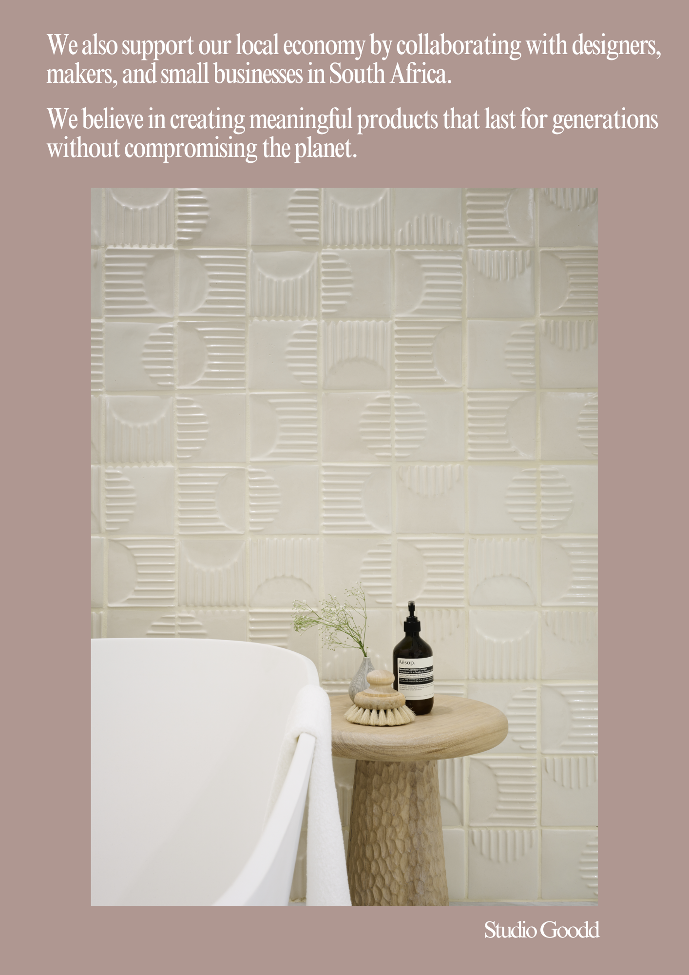Handmade off-white ceramic tiles featuring a geometric textured pattern, installed as a feature wall in a contemporary bathroom with natural materials and artisan finishes.
